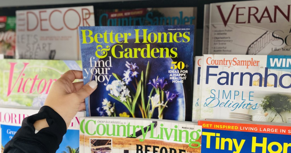 hand holding better homes and gardens magazine