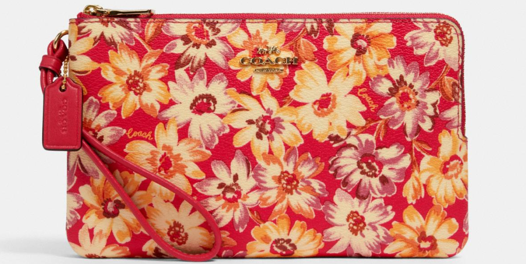 Coach wallet with flowers on it