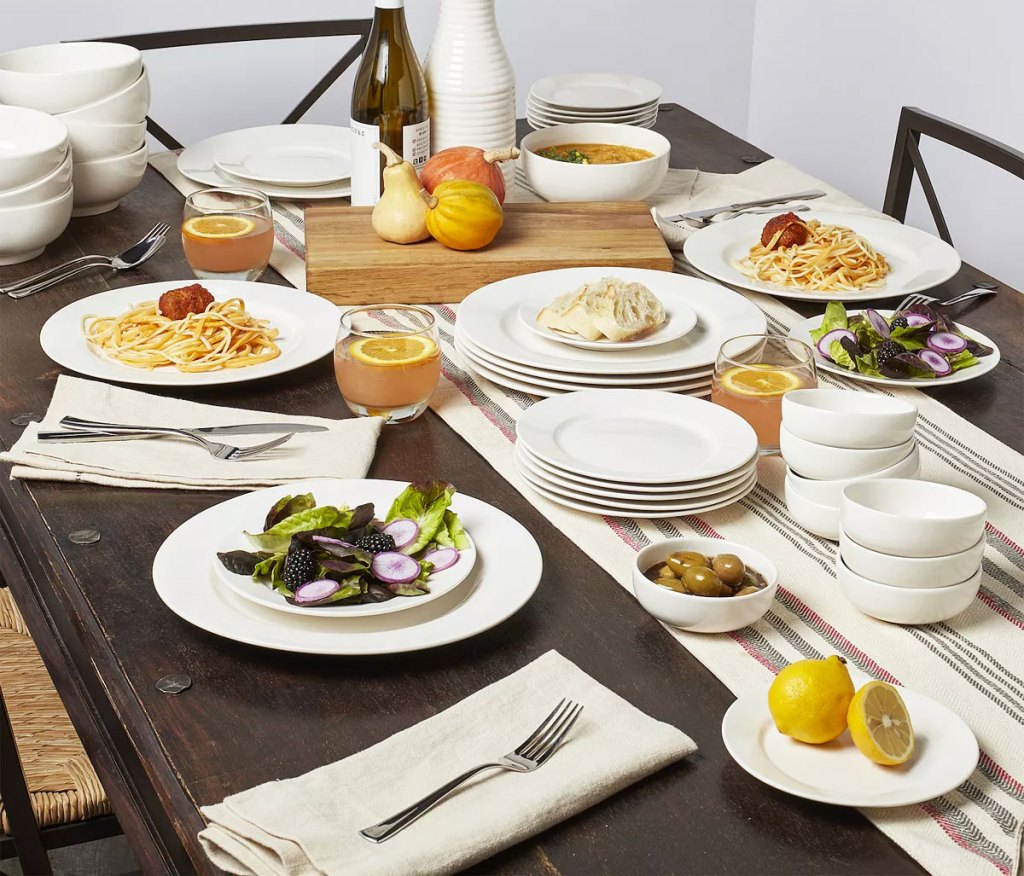 table set with white dinnerware