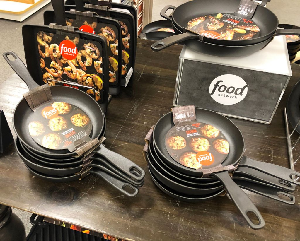 food network cast iron skillets on display table at kohls