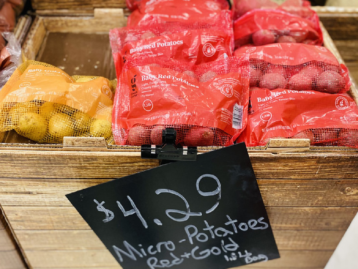 bags of baby gold and red potatoes in store