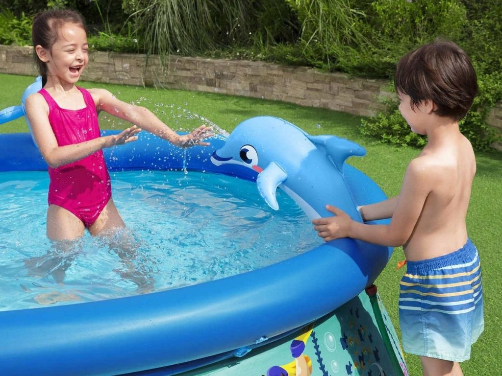 kids playing in H2OGO! Costco Splash Pool