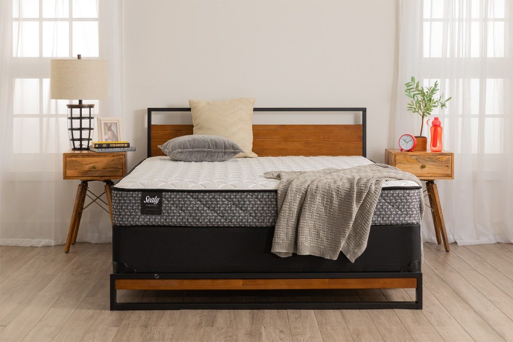 mattress on wooden bed frame