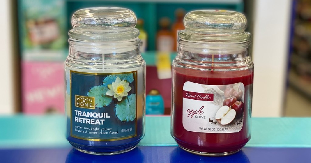 two large candle jars in store