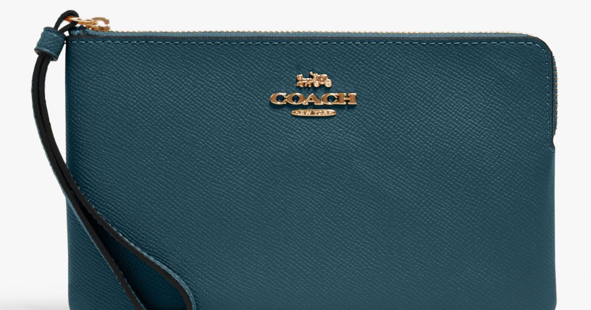 teal coach wristlet with zipper at top