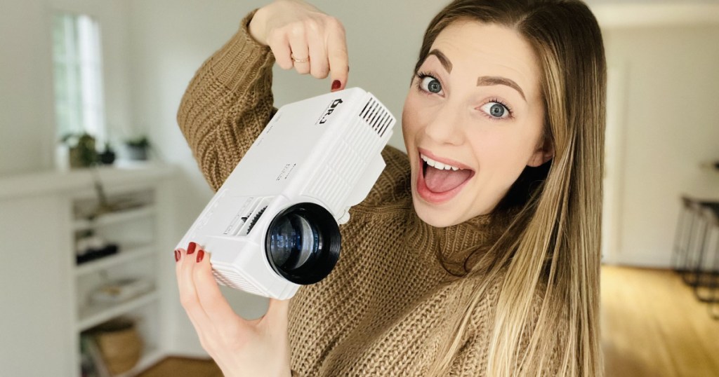 woman holding dr j projector