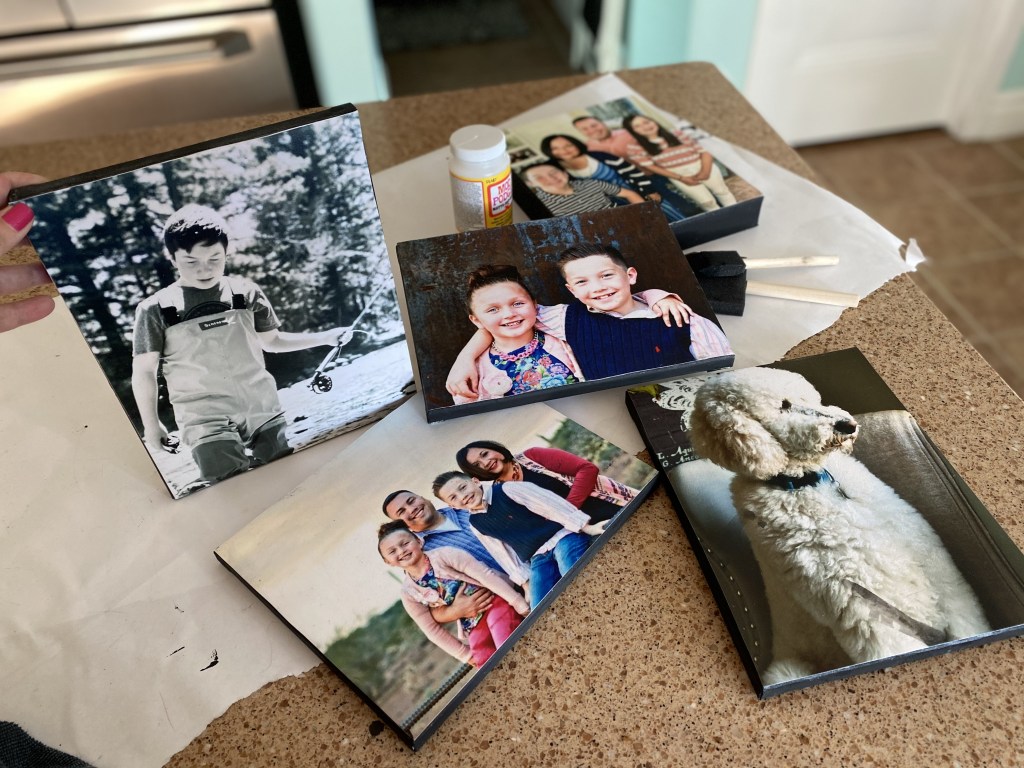 pile of diy photo canvases on the counter