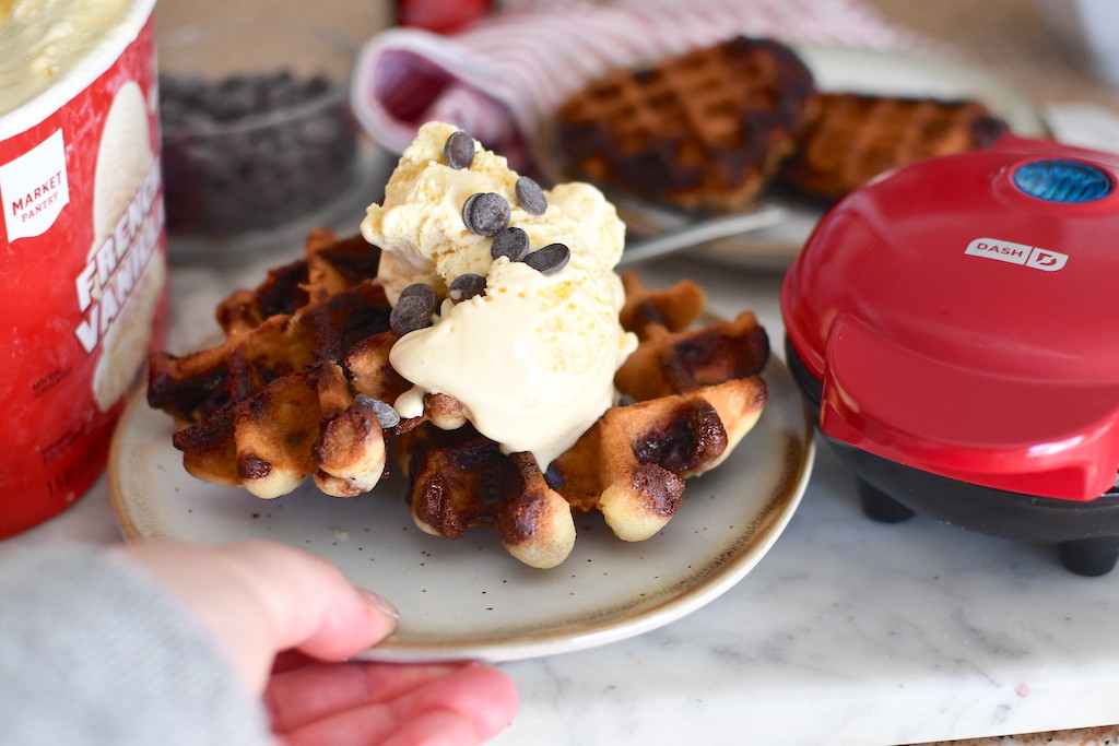 serving cookie waffles with ice cream and chocolate chips 