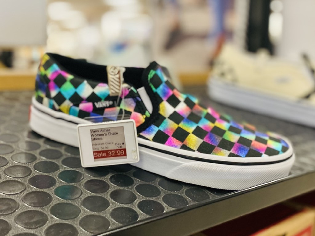 checkered colorful slip on shoes on store display