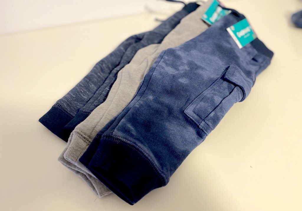 pile of blue and gray toddler garanimals joggers