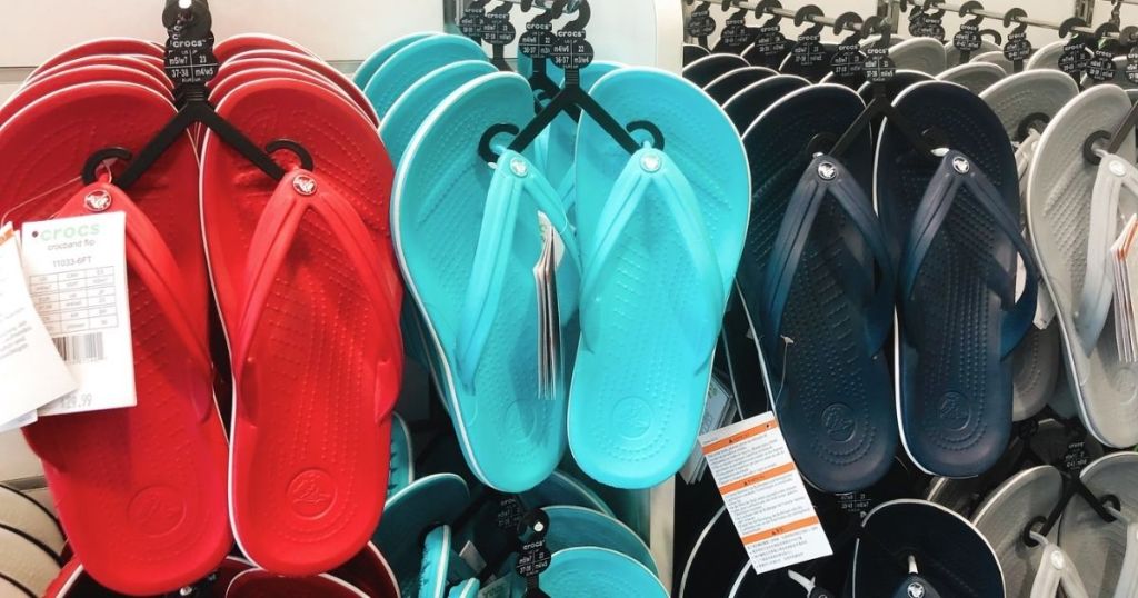 Crocs Crocband Flips hanging up in store