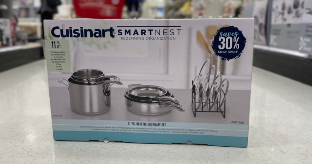 stainless steel pans in box on floor