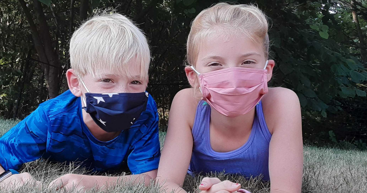 Two kids wearing Old Navy face masks