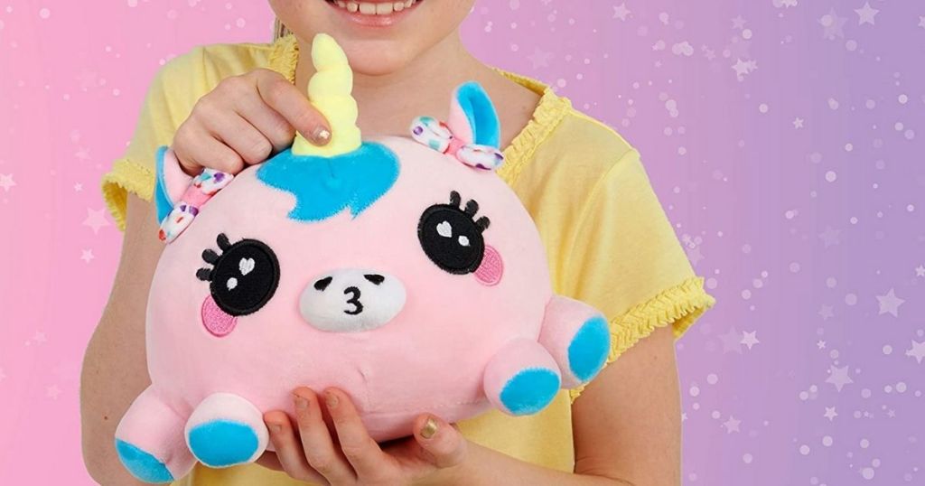 child with Ploosh Pink Unicorn Kissimal