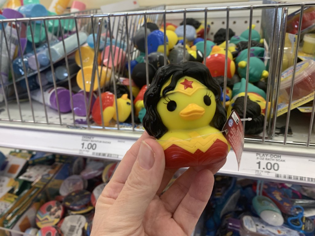 hand holding wonder woman rubber duck