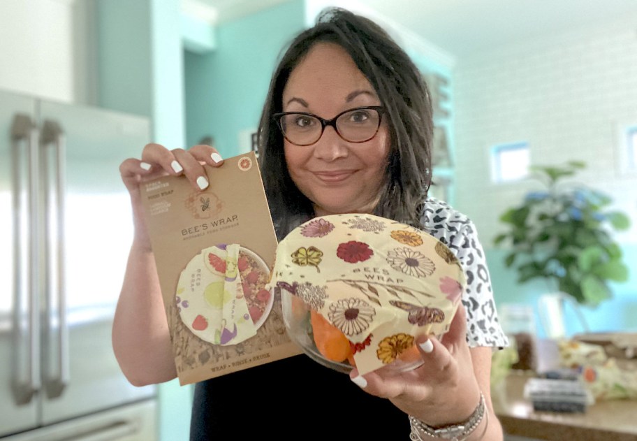 woman holding package and bowl with bee's wraps