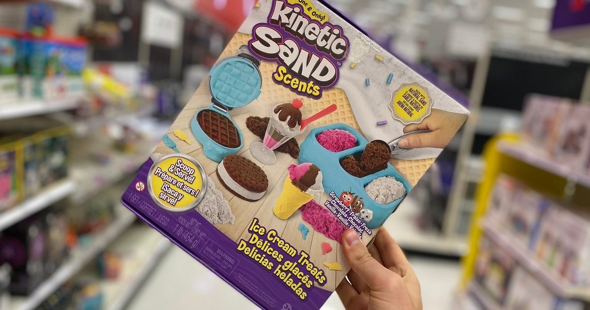 holding Kinetic Sand ice cream set