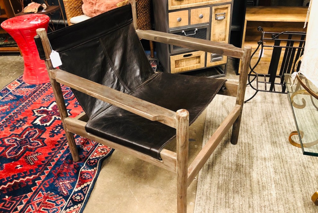 modern sling chair sitting in store with tag