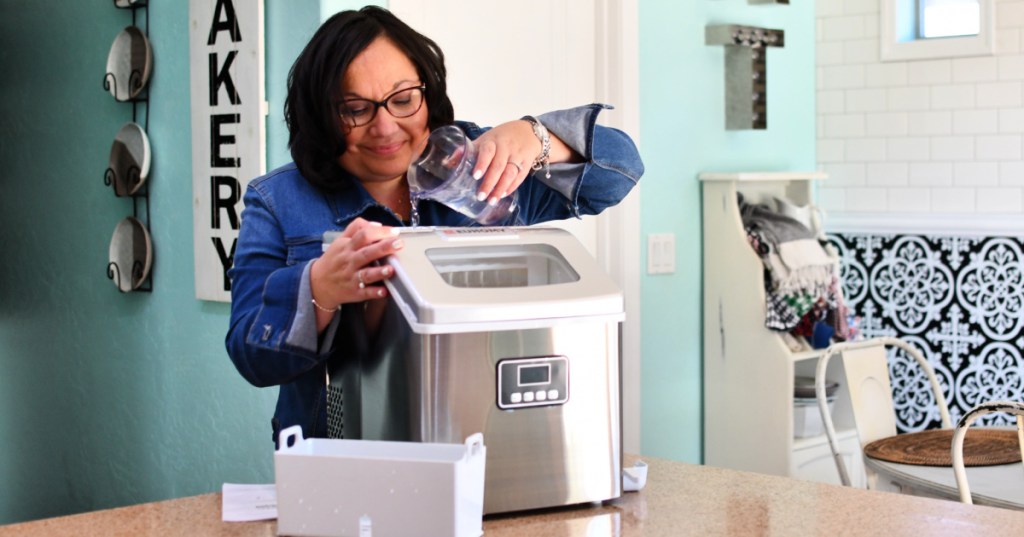 pouring water into ice maker