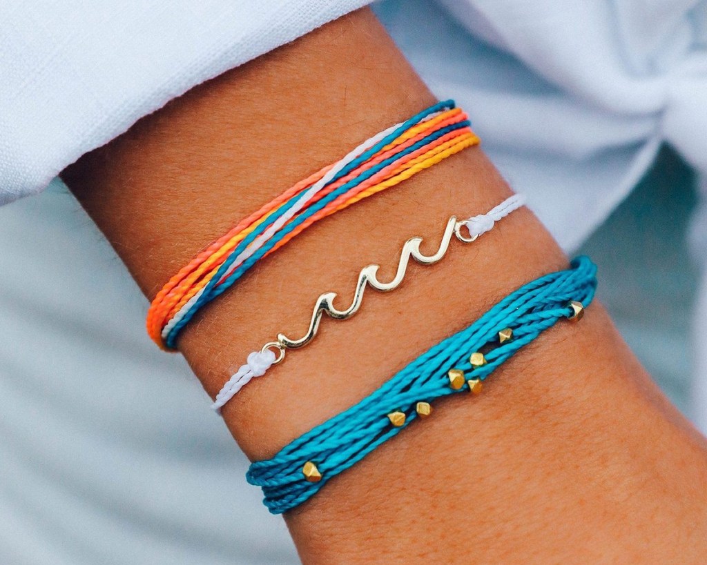 pura vida riptide pack on arm