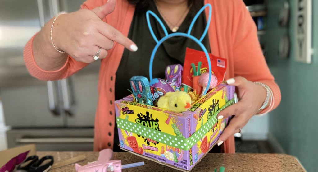 woman holding a DIY edible easter basket