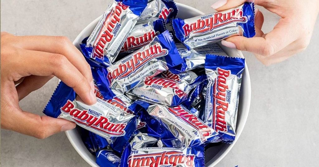 two hands grabbing Baby Ruth Bars