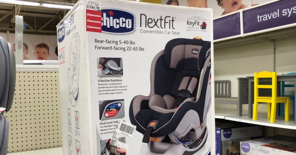 grey and black car seat on shelf 