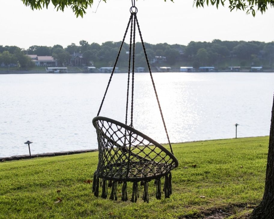 Equip Boho Macrame Hanging Chair in a tree by water