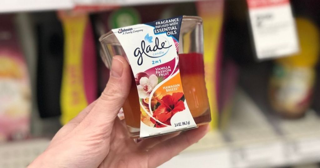 hand holding glade jar hawaiian breeze and passion fruit candle