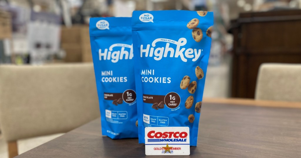 Bags of Highkey mini cookies near a Costco card