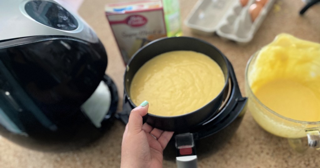 placing cake in air fryer 