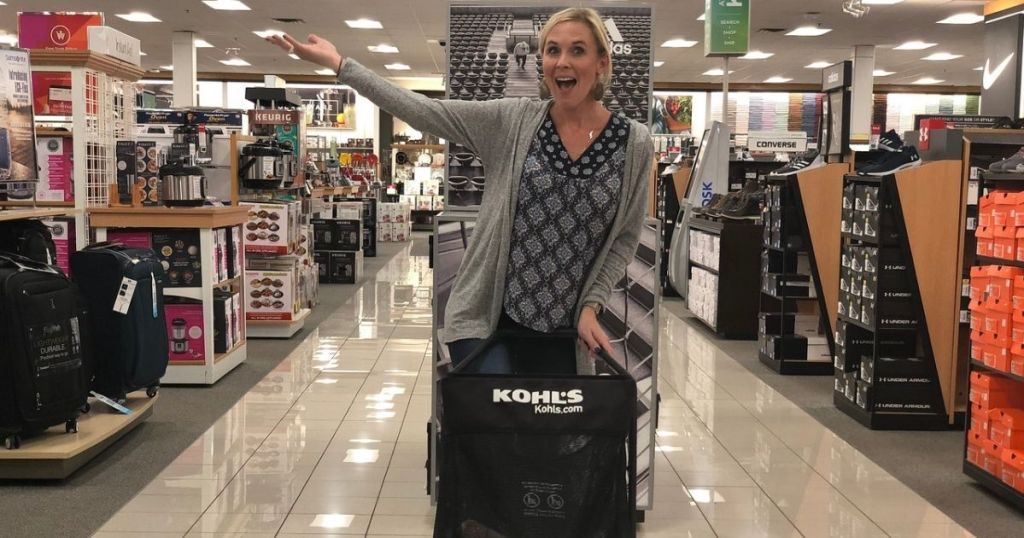 woman excited to shop with her Kohl's shopping cart