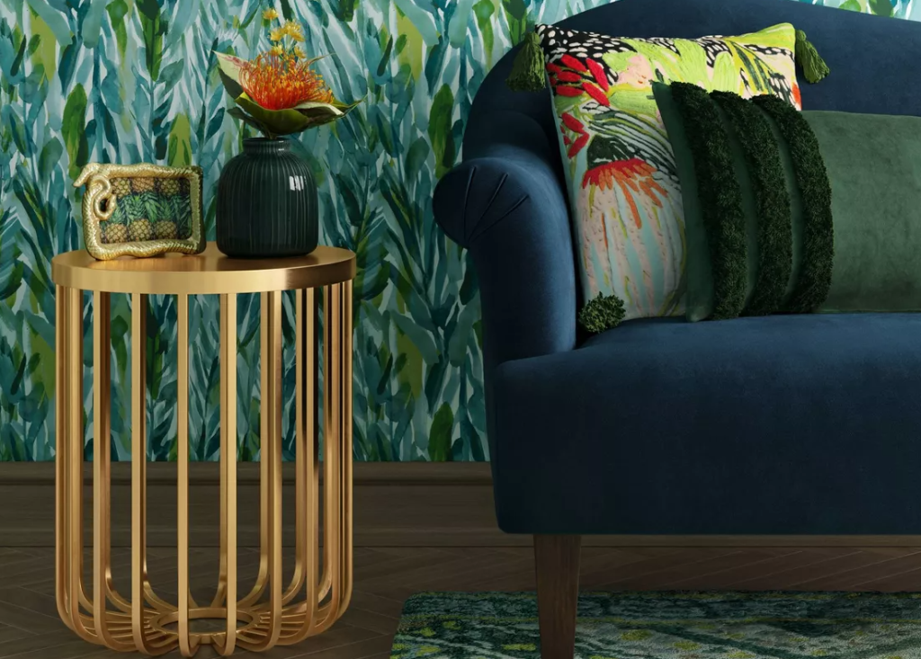 gold side table next to a couch