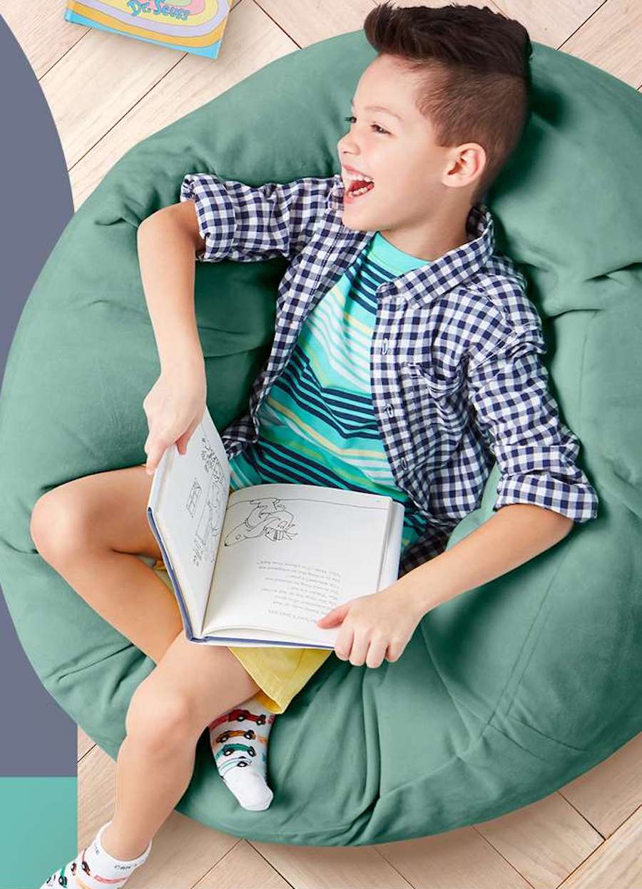 kid sitting on Pillowfort Bean Bag