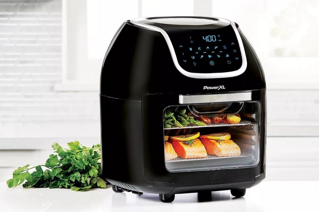 PowerXL 10qt Vortex Air Fryer Proon counter with food inside