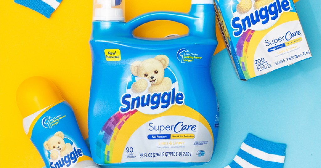 large bottle and small bottle of fabric softener, dryer sheets, and two blue and white striped socks