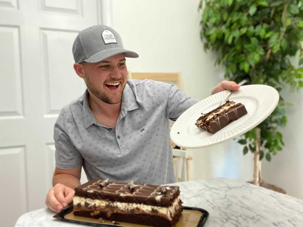 Stetson Eating Tuxedo Cake