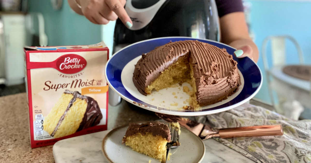 woman holding an air fryer cake 