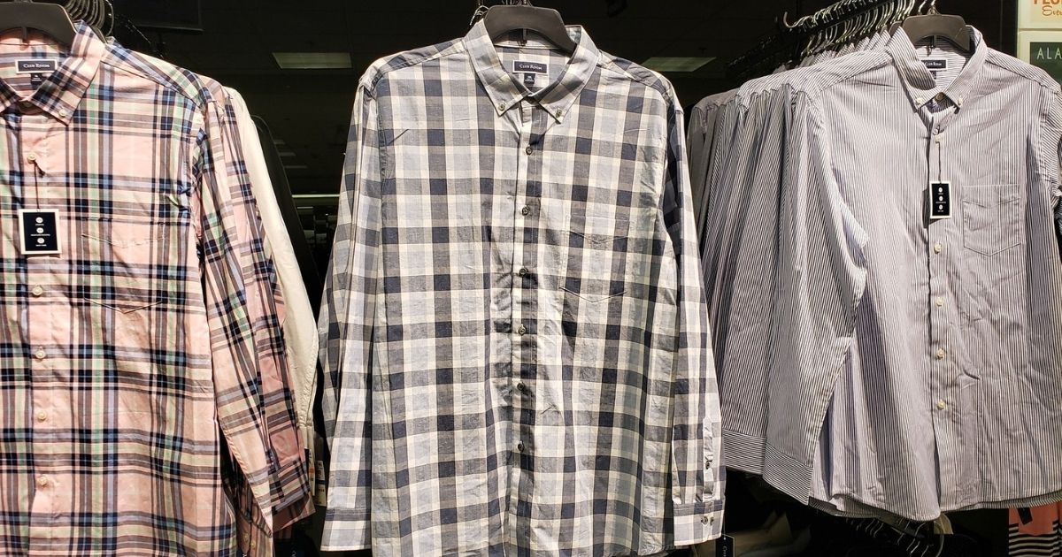 mens dress shirts hanging in store