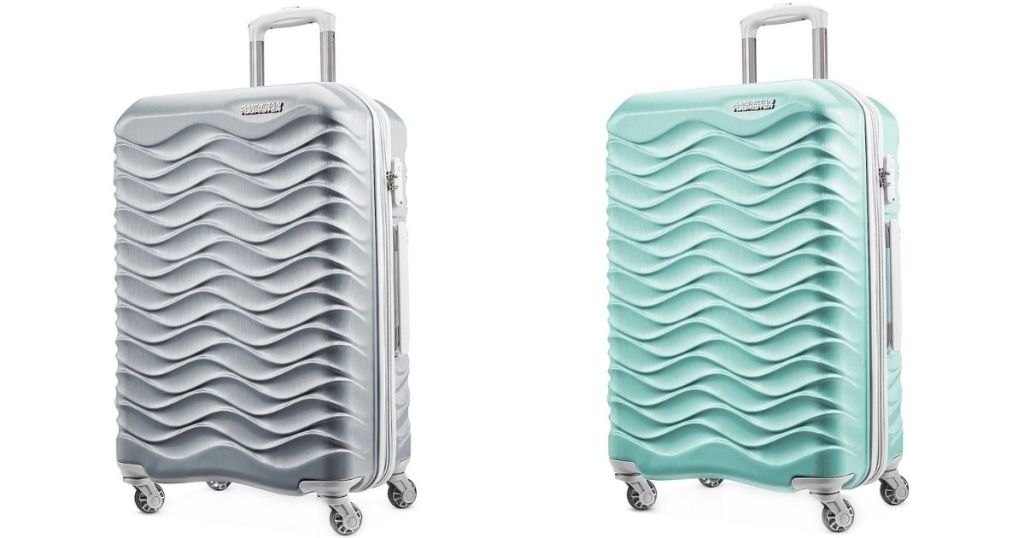 silver and teal luggage