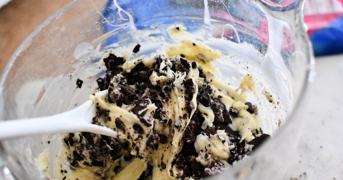 mixing oreos and chocolate in bowl