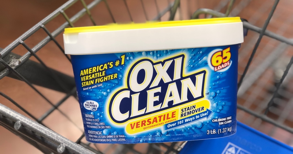 tub of oxi clean stain remover in a store cart