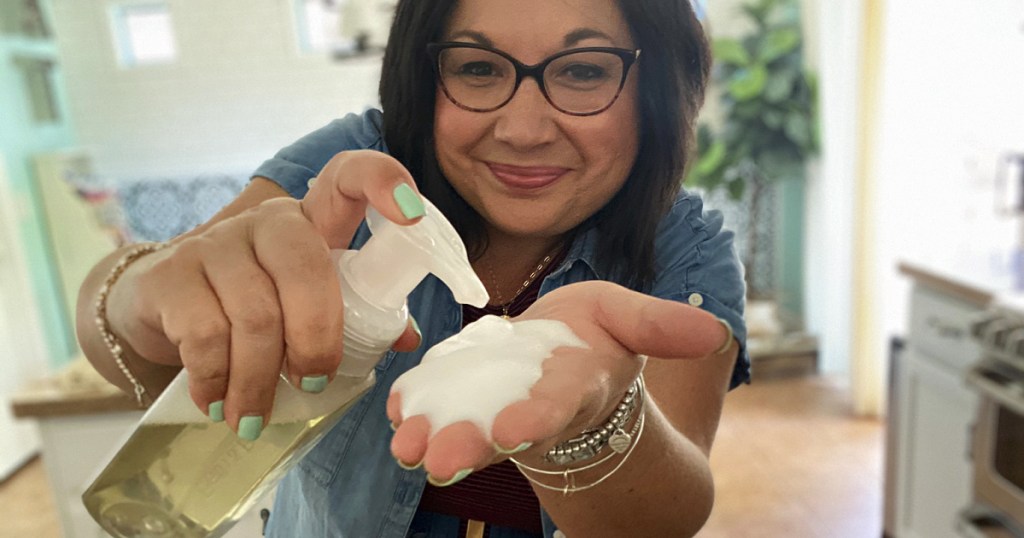 woman using DIY foaming soap refill