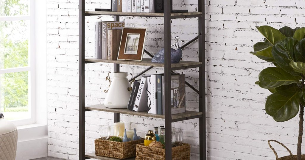 industrial 5-tier bookcase against a white brick wall