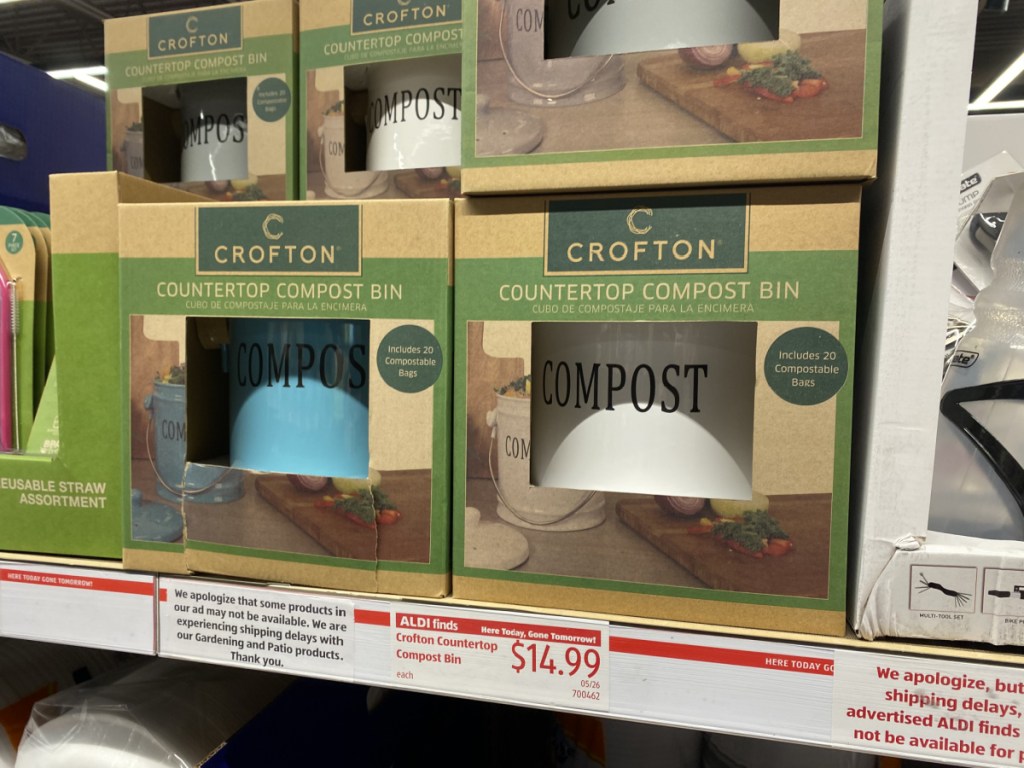 in-store display of compost bins in packaging