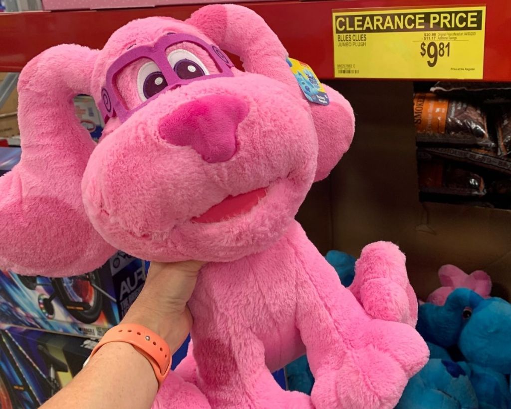 hand holding pink Blues Clues Jumbo Plush by clearance sign in-store at Sam's