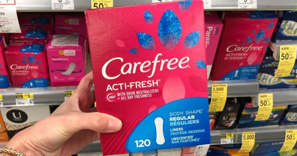 hand holding a package of Carefree liners