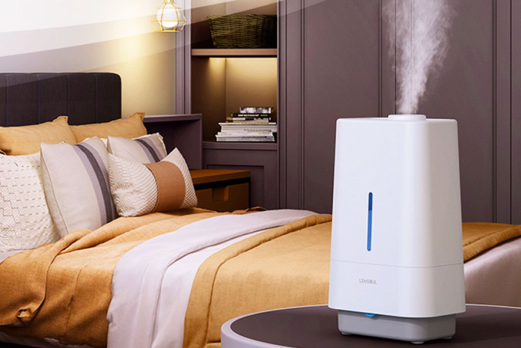 humidifier in bedroom near bed