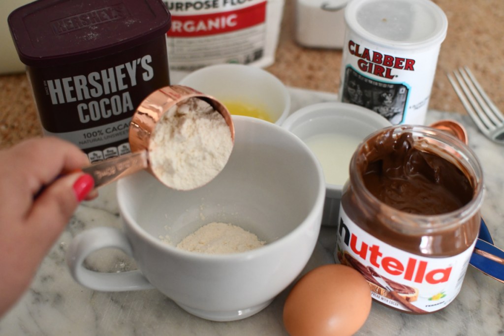 Preparing the batter for nutella mug cake