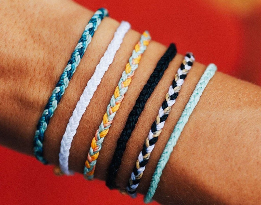 braided bracelets on arm